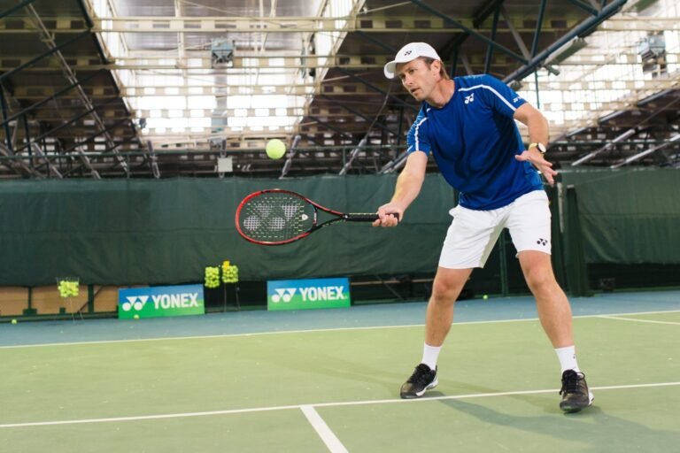 tennis players competing on a professional court