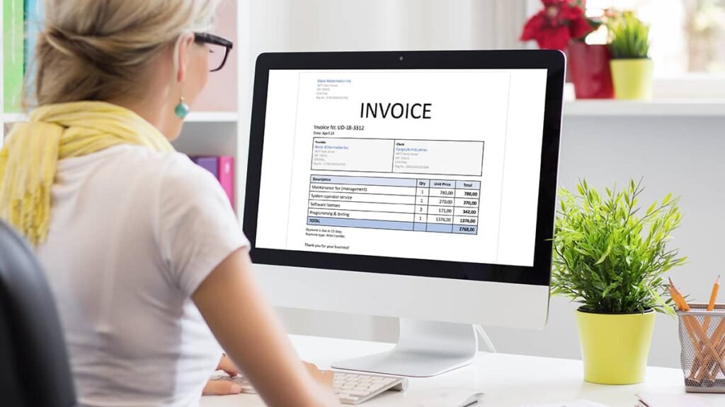 Cos'è la fattura elettronica e come funziona lo split payment 1 un computer con fattura elettronica sullo schermo