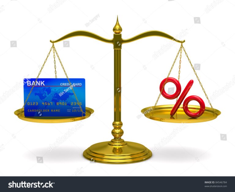 una bilancia con denaro e percentuali