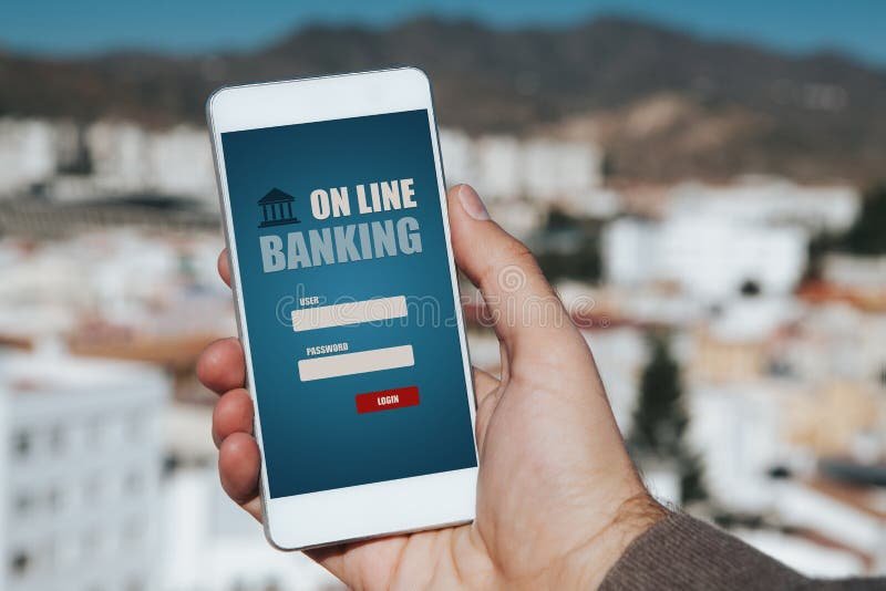 Come si effettua un bonifico dall'estero su un conto italiano 1 una mano che tiene un telefono con unapp bancaria